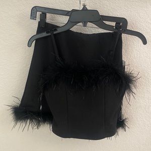 NWT Small black skirt set with feathers.